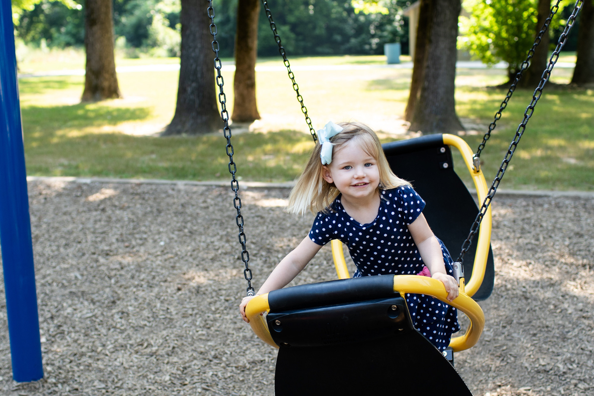 Girl on Swing Set